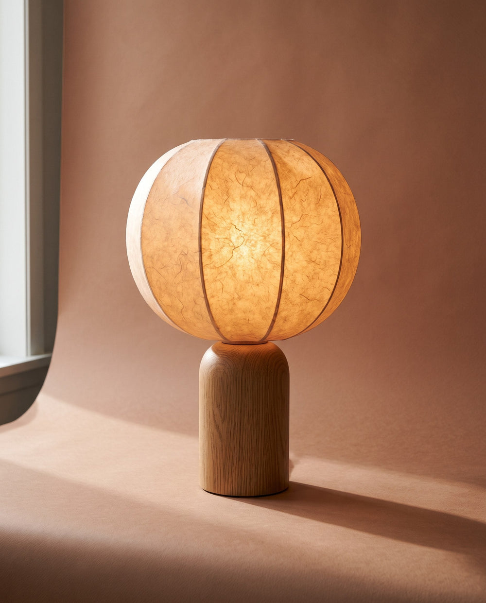 Paper table lamp on an oak base