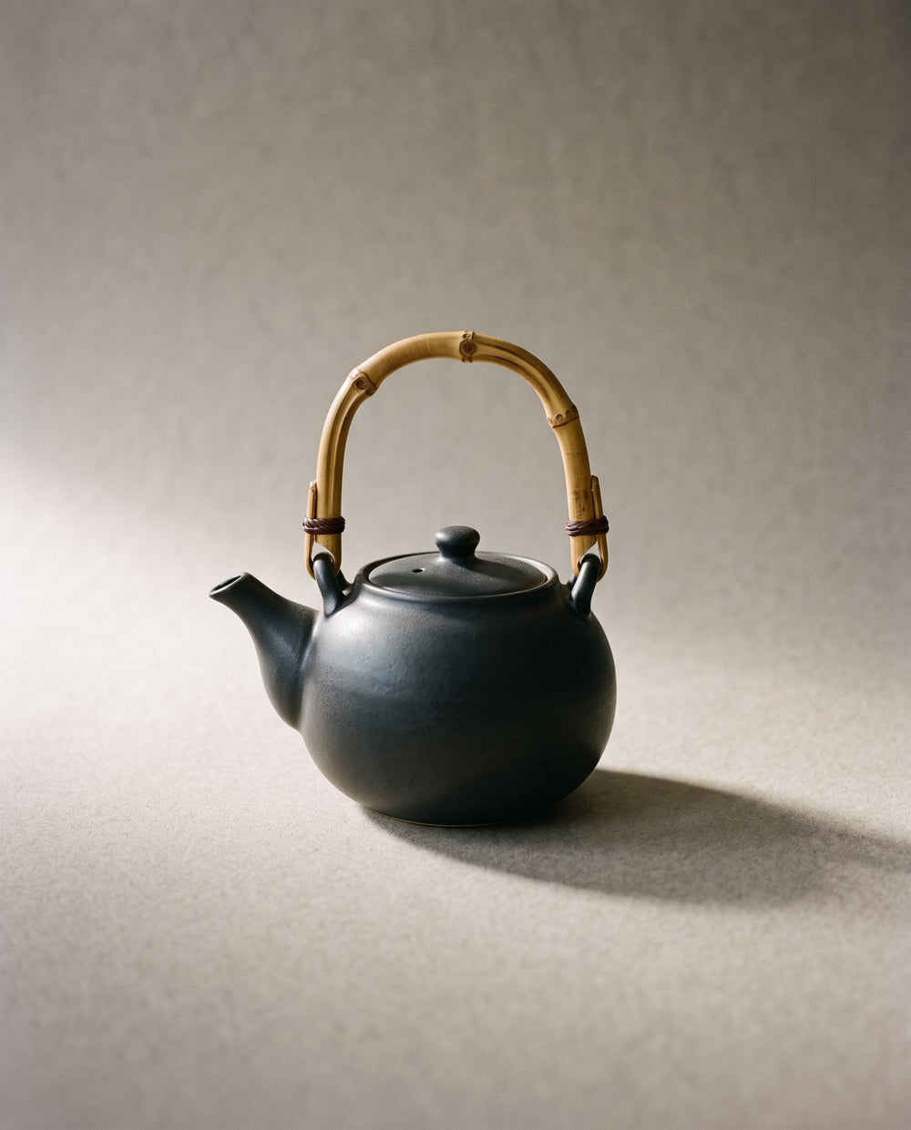 Round charcoal teapot